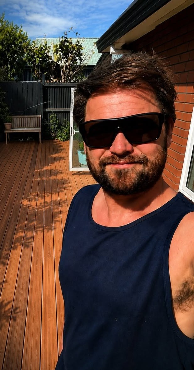 Aaron on a completed timber deck in Christchurch